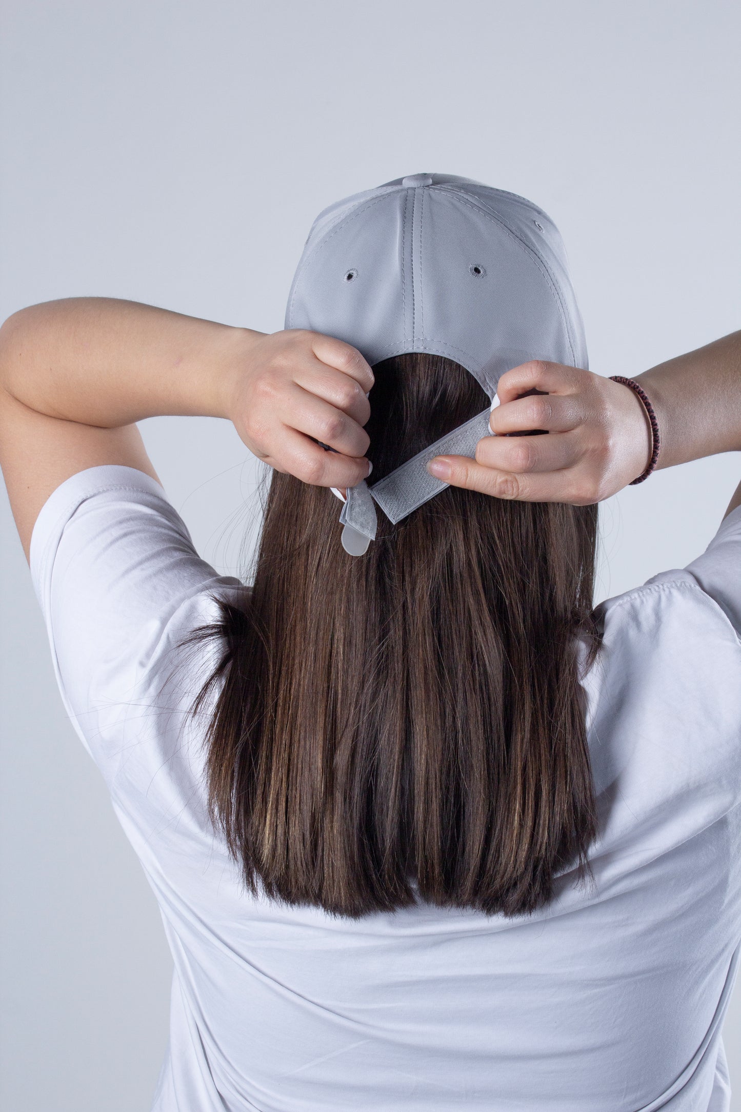 Gorra deportiva e impermeable gris perla