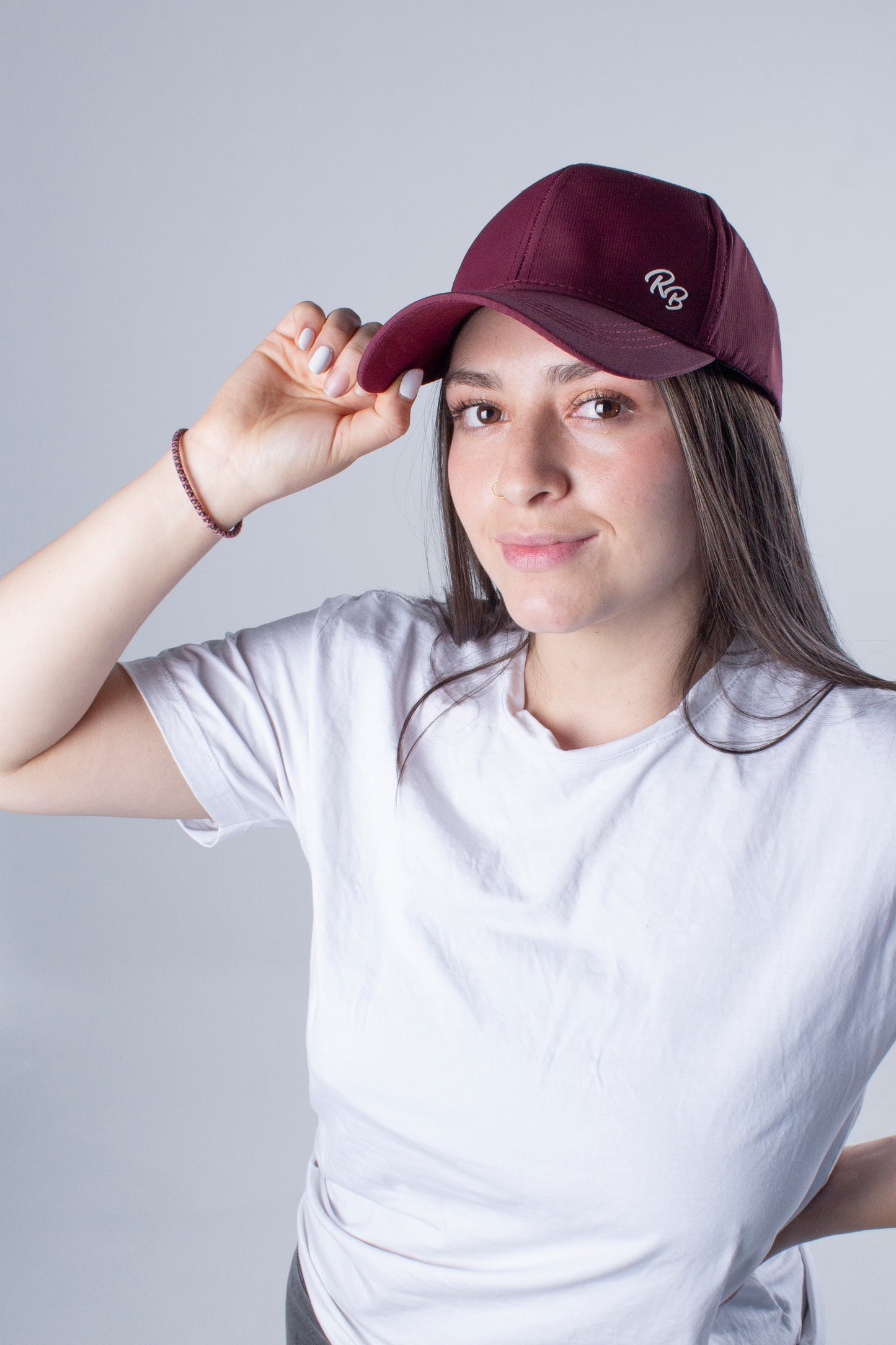 Gorra deportiva e impermeable vinotinto