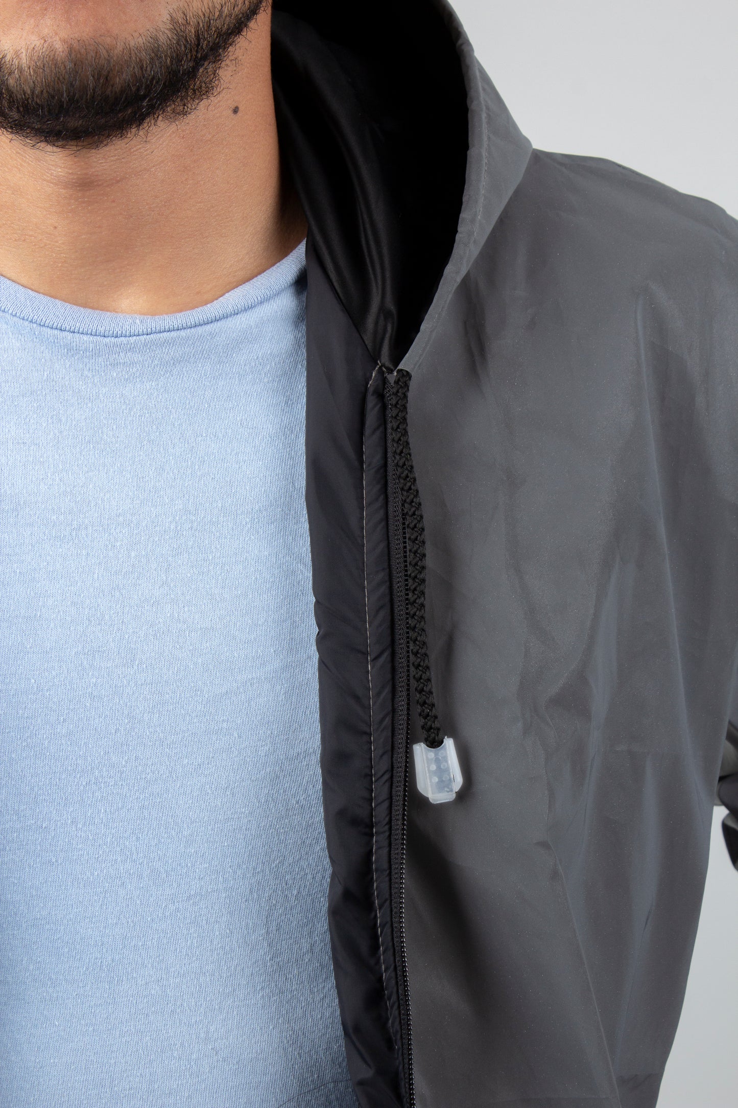 Chaqueta reflectiva con cierre negro