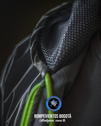 Chaqueta reflectiva con cierre verde neón