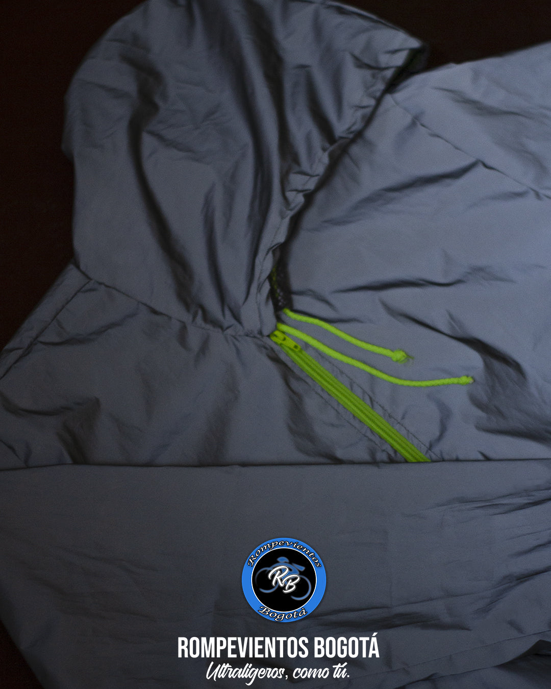 Chaqueta reflectiva con cierre verde neón