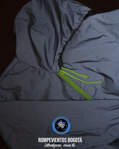 Chaqueta reflectiva con cierre verde neón